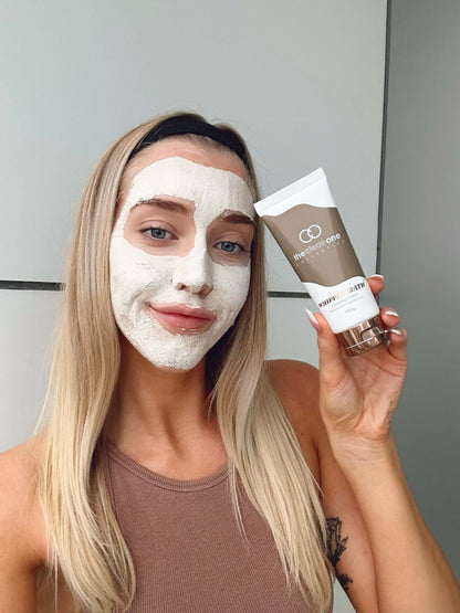 WHIPPEDEARTH® breakout mask texture applied on skin with tube held in hand